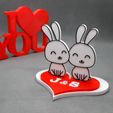 Conejitos_amorosos.jpg Conejitos amorosos con base de corazón