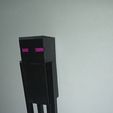 IMG_20240111_203419_944.jpg Enderman Minecraft phone holder and toy for kids. Custom colored paper eyes