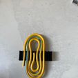 WhatsApp-Image-2024-07-16-at-11.25.26-4.jpeg Einstellbarer Kabelhalter für alle Kabel
