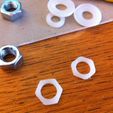 photo_2.jpg Inserção de anilha hexagonal para Prusa Improved X-end