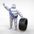 Mim-1.1.4.jpg Michelin man with his tire