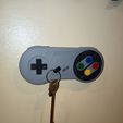 photo_2024-08-30_22-07-19-5.jpg SUPER NINTENDO KEYCHAIN AND HOLDER
