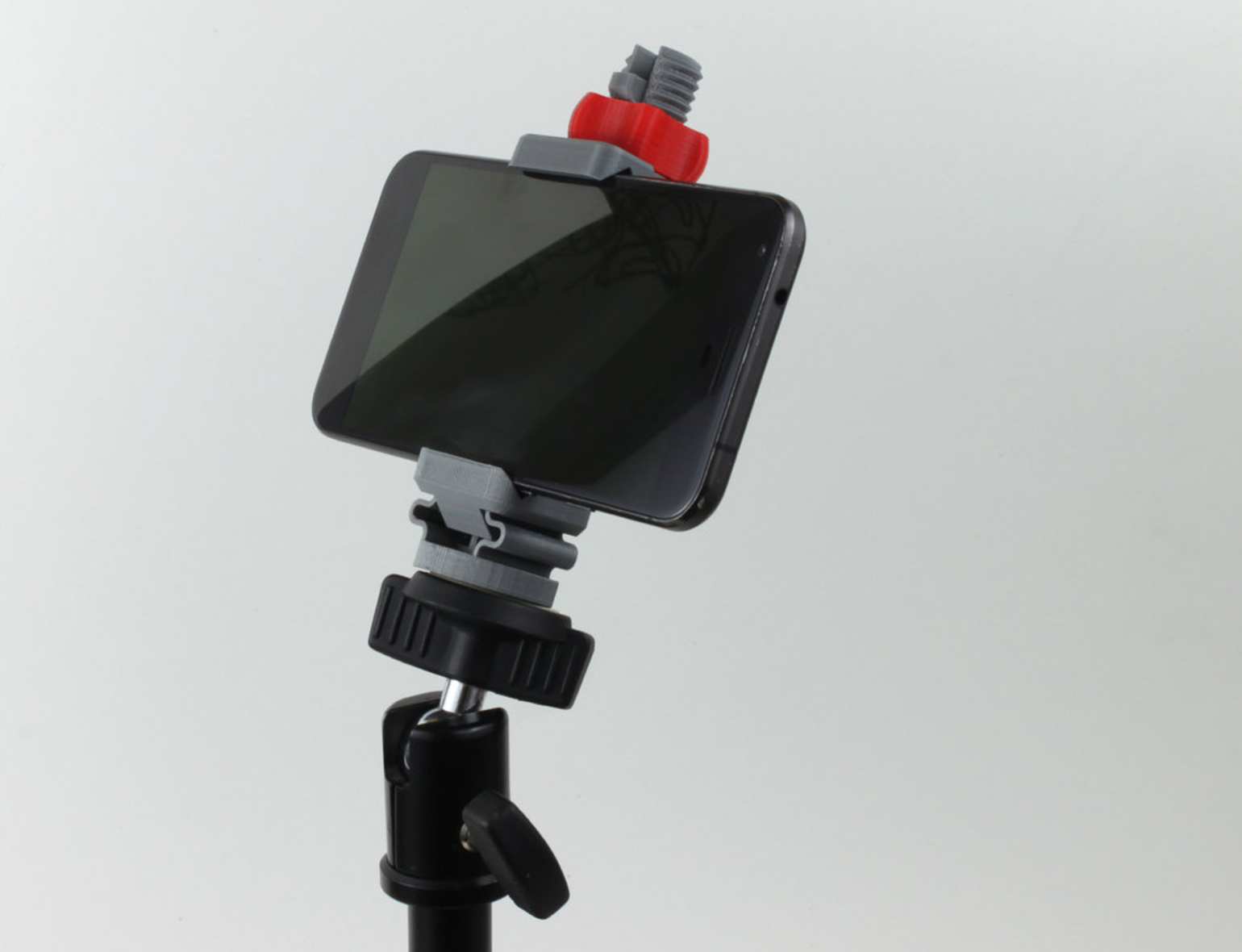 Universal Phone Tripod Mount 3D printing3.png Fichier STL gratuit Trépied pour téléphone universel・Idée pour impression 3D à télécharger, jakejake