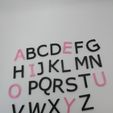 IMG_20210322_173632.jpg alphabet in stick letters, upper case script