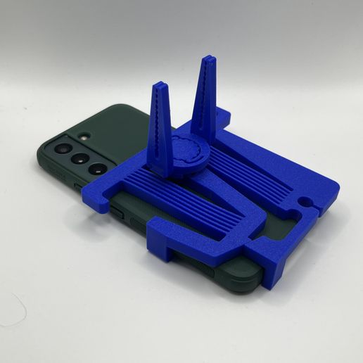 IMG_1131.jpeg Compliant mechanism phone holder