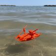 es i ce ei twin-hulled rowboat