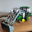 1700557259892.jpg Tractor Front loader hydraulic / electric. Front loader hydraulic / electric for Radio Control tractor.