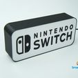 IMG_4418.jpg lâmpada de caixa com logótipo nintendo switch
