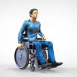 Dis2-.22.jpg N2 Disable man on wheelchair