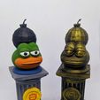 272134822_10226559704243574_3740830035778378994_n.jpg BombCrypto Totem