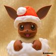 Eevee-in-a-Christmas-Sock_3.jpg Eevee in a Christmas Sock