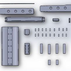 8. parts for one side.JPG deadshot full auto handgun movie prop (assembly model)
