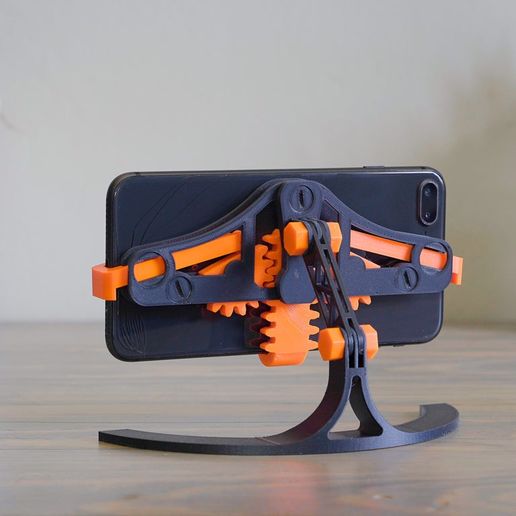 c822025c9886c083843e583df89e0770_display_large.jpg Mechanical Quick Grab/Release Phone Stand