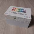 2fbd1288-a67f-4bec-882d-cd5658223646.jpg Unstable Unicorns box (all expansion with original lid)