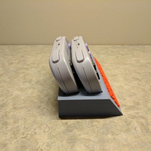 4409086961a5da217714f3b7602572d7_display_large.jpg Suporte de controlador 8Bitdo SNES30/SFC30