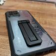 IMG-20230926-WA0007.jpg PHONE STAND - STICK WITH CASE