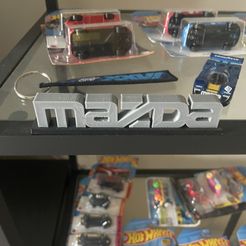 IMG_5847.jpg Mazda Logo Display Sign.