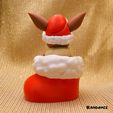 Eevee-in-a-Christmas-Sock_2.jpg Eevee in a Christmas Sock
