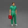 3DG-0001.jpg paramedic Standing And Holding first Aid box