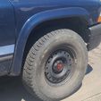 20240714_124538.jpg Hubcap 6x4.5in   Dodge, Nissan Autobot Transformers