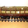 Wagon.jpg Stakes for UTJ's flatbed car 1:32