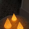 1730967431767.jpg Christmas tree candles (cones)