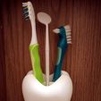 64b61849-f351-4f06-b2c8-b70e75b377b8.jpg Toothbrush Holder Tooth
