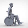 Dis2-.24.jpg N2 Disable man on wheelchair