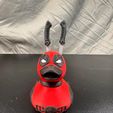 1733631242136.jpg Deadpool swords in butt rubber duck