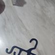 4ab5c9b3-31c5-4807-b1af-422c7db95005.jpg Space-Saving Cap Hanger - No Supports