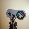photo_2024-08-30_22-07-19-4.jpg SUPER NINTENDO KEYCHAIN AND HOLDER