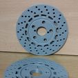13-thick.jpg brake discs as coasters in two versions for 4 thick and 10 thin coasters