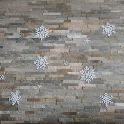 265430501_564790968018285_4100275024610022106_n.jpg Snowflakes on wall