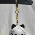 WhatsApp-Image-2025-12-12-at-19.49.44_94773f6a.jpg Porte-clés chat chibi - Modèle imprimé en 3D (Porte-clés pendentif chat kawaii)