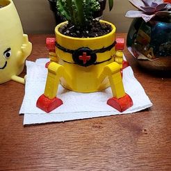 received_692680762346813.jpeg Easy to print Robot Planter