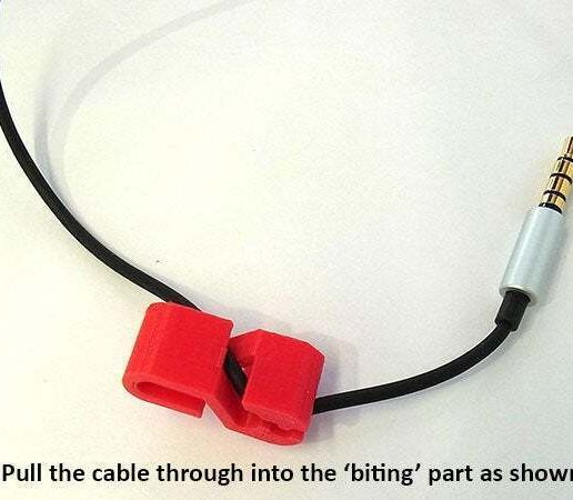 177c523fcfd2354038e1c9464836adbf_display_large.jpg Clip para cable de auriculares