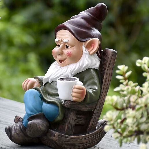 11.jpg Gnome Relaxing in a Rocking Chair with Coffee