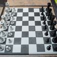 board-with-pieces.jpg 3D-Print-Optimized Geometric Chess Set Pieces