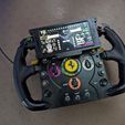 301389249_443763847522922_8405301590801406075_n.jpg Thrustmaster F1 Wheel - S7 Edge Phone Mod