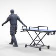 AW1-1.2.8.jpg N1 Ambulance worker pulling wheeled stretcher or trolley
