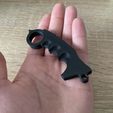 IMG_2194.jpeg Zappel-Karambit-Schlüsselanhänger