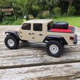 IMG_20220501_111131.jpg axial SCX24 Jeep Gladiator bed cover with spare wheel and Maxtrax plates