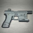 IMG_20240229_172740.jpg Puntal para pistola Glock con accesorios