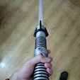 91ca142ba4aa416a0906a8cb561d35fa_display_large.jpg Lightsaber with lights and sounds