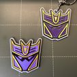 IMG_6564.jpg Transformers Megatronus Prime Badge & Keychain
