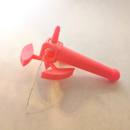 Spinning Orbital Tops with Launcher