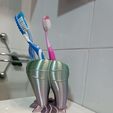 photo_2023-01-05_06-29-58-2.jpg Cute tooth-shaped toothbrush holder