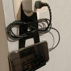 1702144260782.jpg Wall-mounted smartphone charging stand