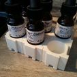 20150201_122928.jpg Interlocking dovetail-sided box for small 1/2 oz. eyedroppers and 15mL e-juice bottles