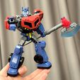 IMG_7958.jpg Unmasked and Masked Heads, Watergun, Grappling Hook and Tread Height Boosters for Legacy United Voyager Animated Optimus Prime